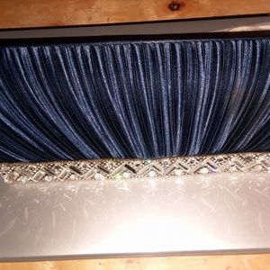 Royal blue pleated clutch
